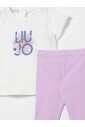 ensemble-combinaison-et-volants-blanc