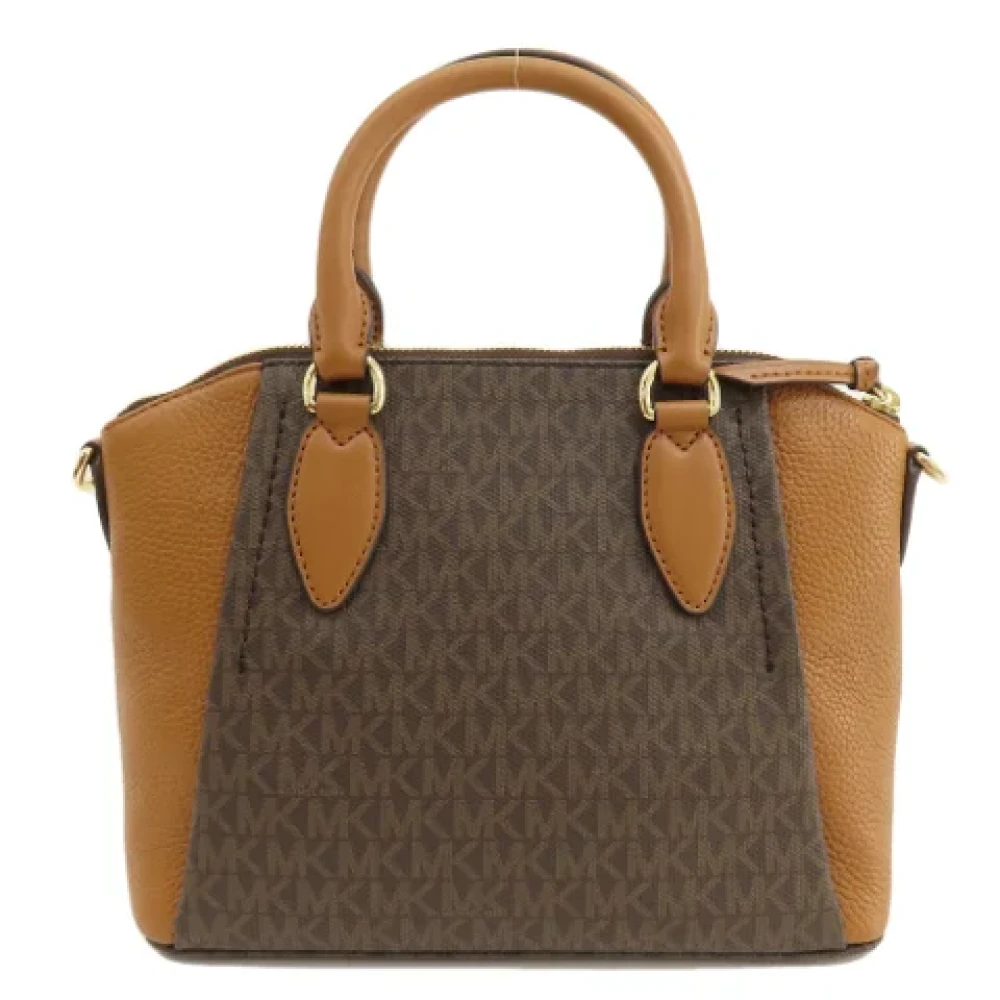 Michael Kors Pre-owned Plastic handbags Brown Dames