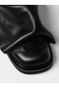 mules-a-semelle-epaisse-en-cuir-noir