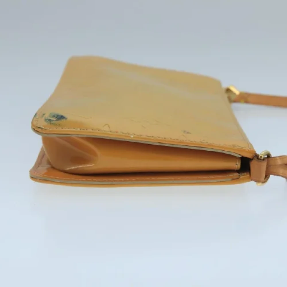 Louis Vuitton Vintage Pre-owned Leather pouches Beige Dames
