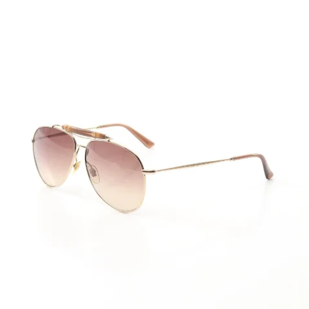Gucci Vintage Tweedehands bruine metalen zonnebril met bamboe frame Brown Dames