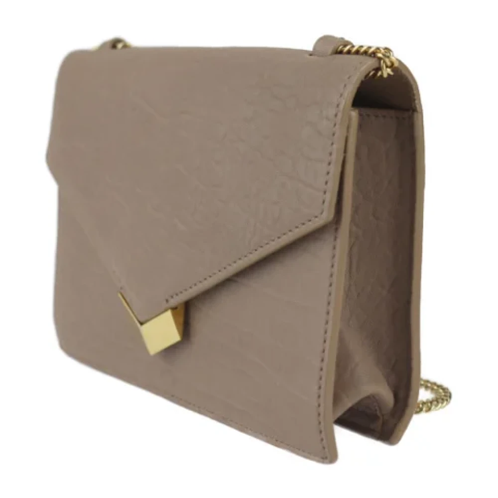 Jimmy Choo Pre-owned Leather clutches Beige Dames