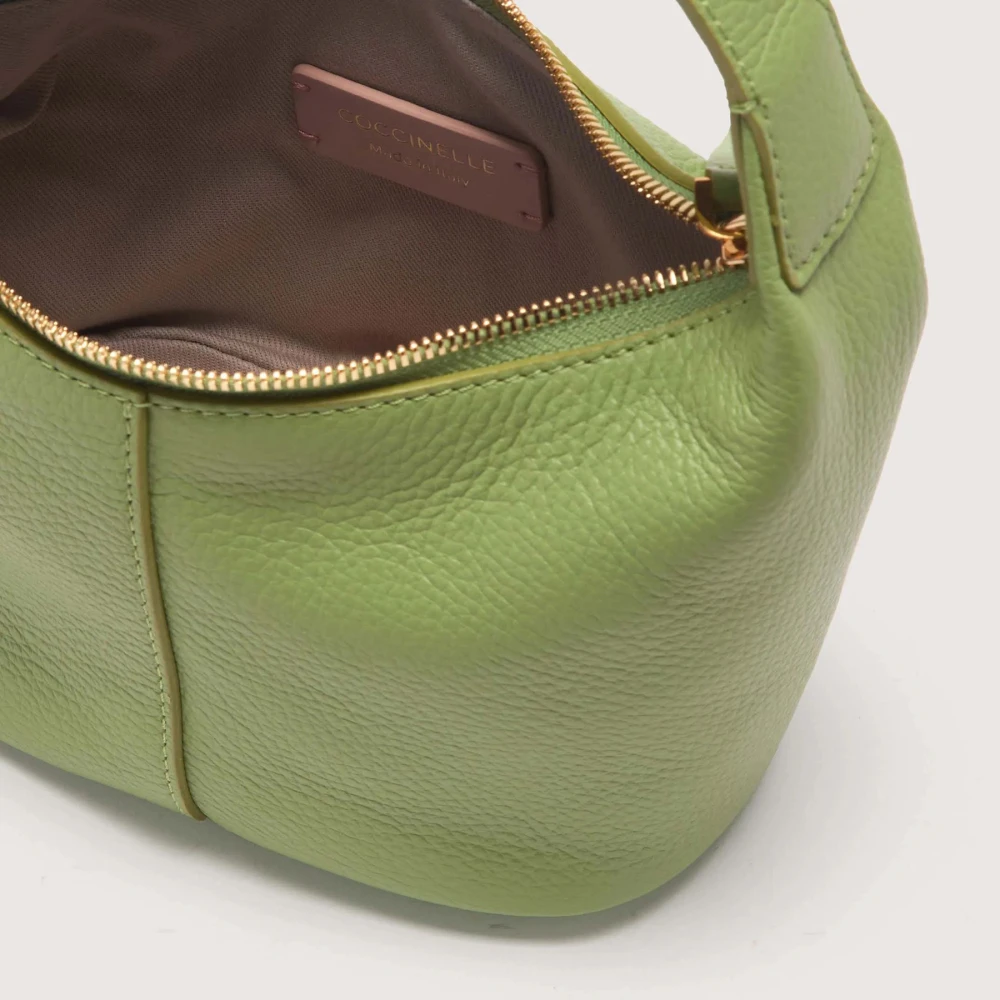 Coccinelle Groene gedeconstrueerde schoudertas met ovaal gesp Green Dames
