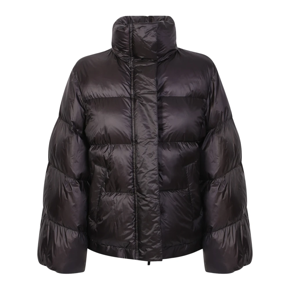 Sacai Down jacket with wide sleeve detail by Sacai. The brand has been described as influential in breaking down the dichotomy between casual and formal wear. Black, Dam