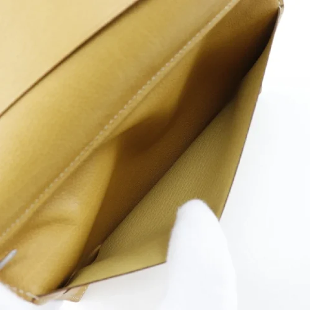 Hermès Vintage Pre-owned Leather wallets Yellow Dames