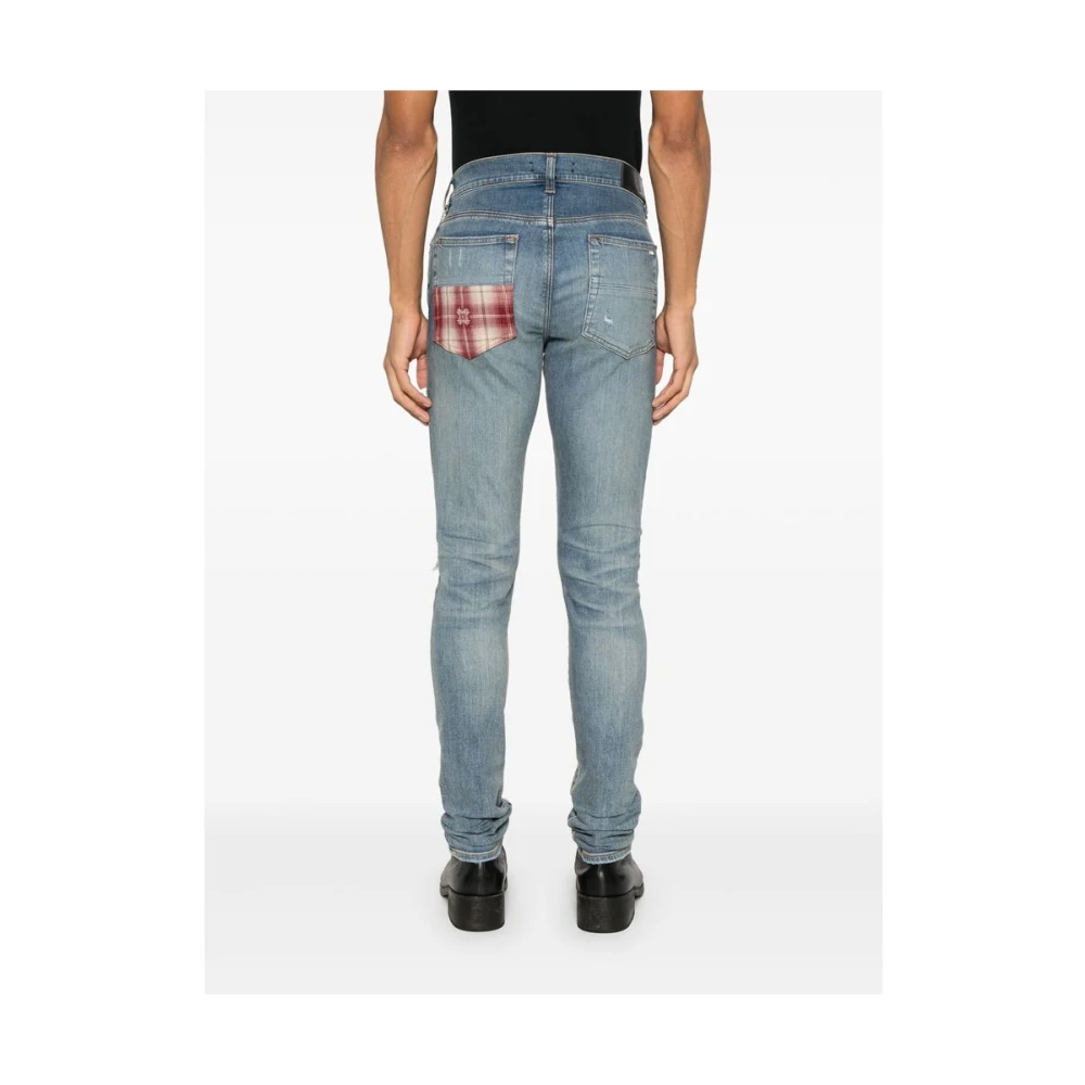 Amiri Lichtblauwe Ripped Jeans met knoopsluiting Blue Heren