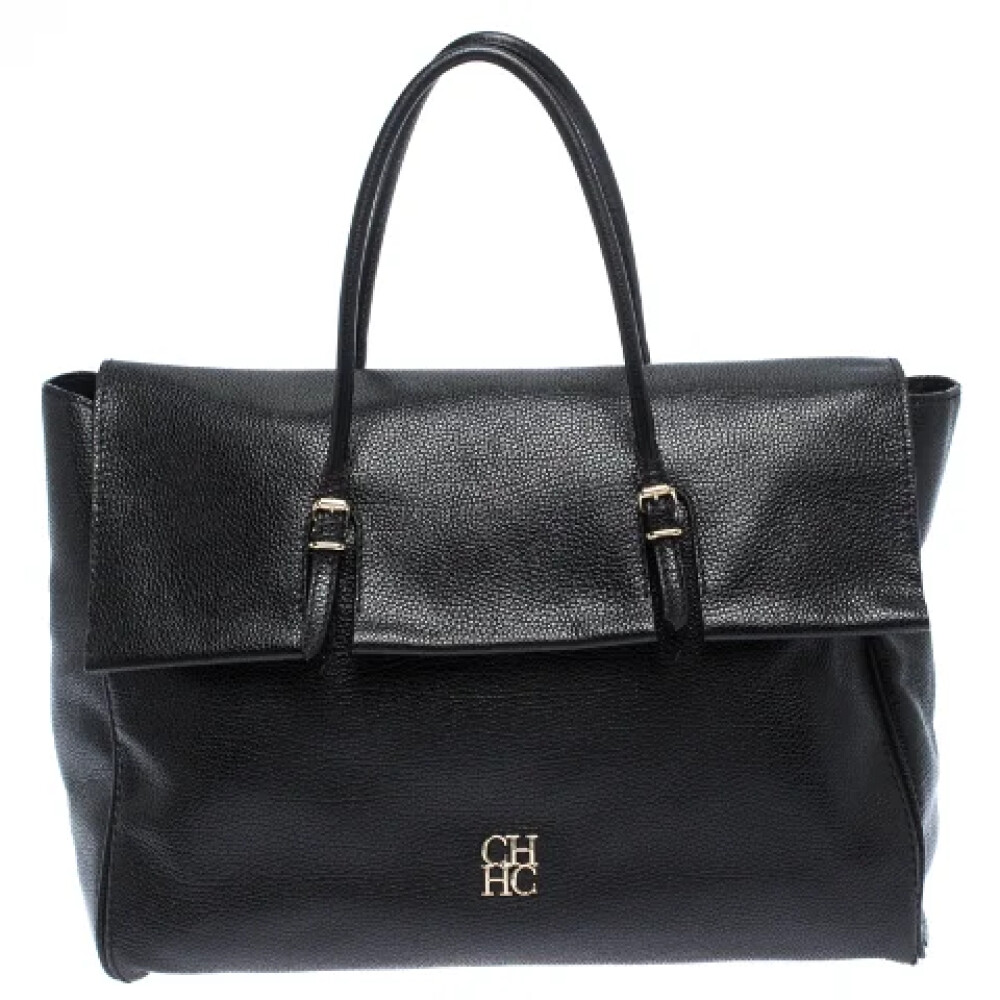 Bolso carolina herrera discount hombre