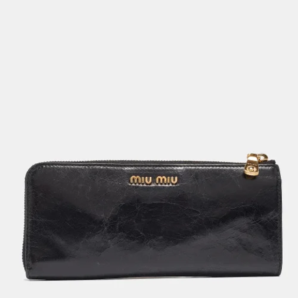 Miu Pre-owned Leather wallets Black Dames