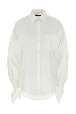 Blus med knytdetaljer