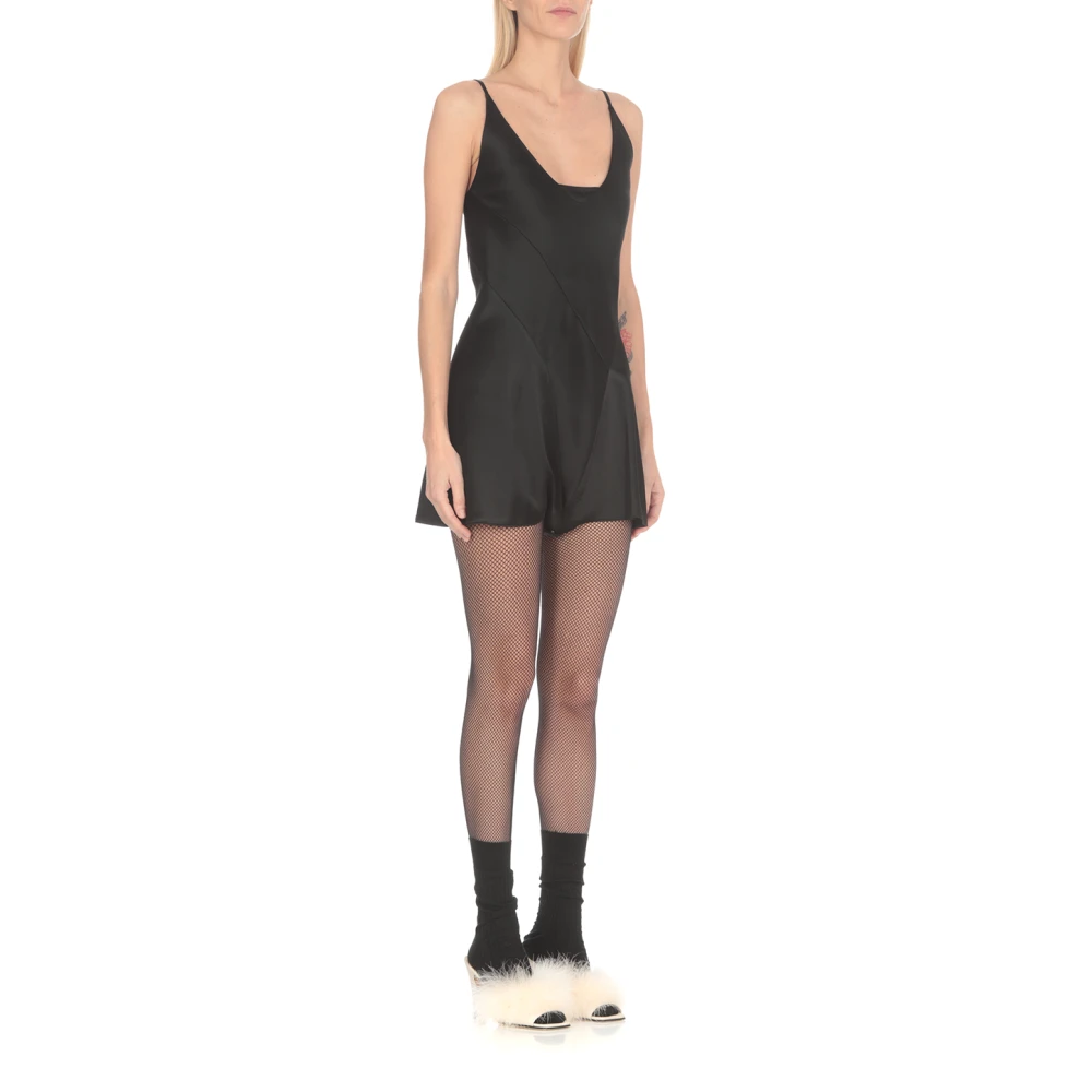 Maison Margiela Zwarte jumpsuit met wijde hals en drukknopen Black Dames