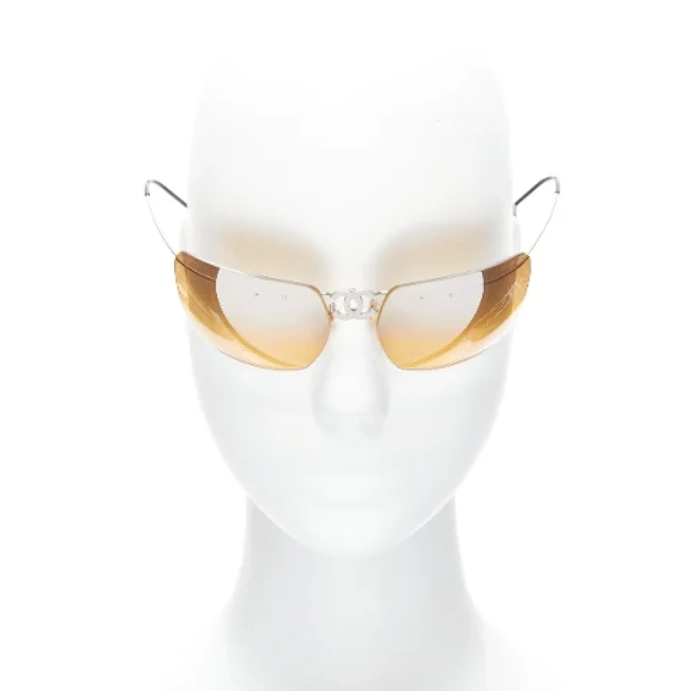 Chanel Vintage Pre-owned Metal sunglasses Yellow Dames