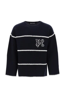 Stickad tröja med broderidetaljer