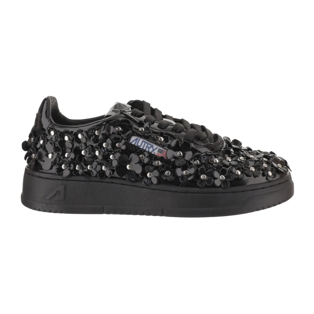 Autry Lage leren sneakers met metalen studs Dames Schoenen Zwart