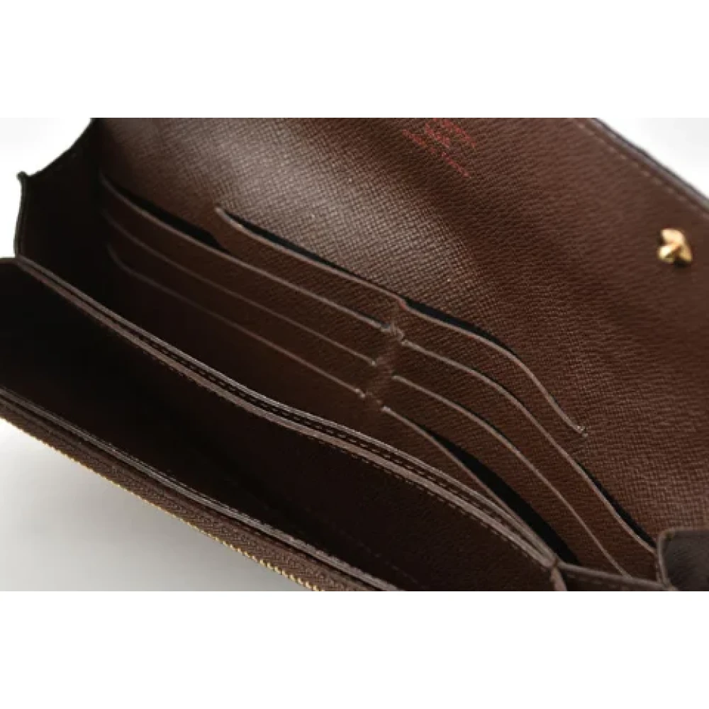 Louis Vuitton Vintage Pre-owned Canvas wallets Brown Heren