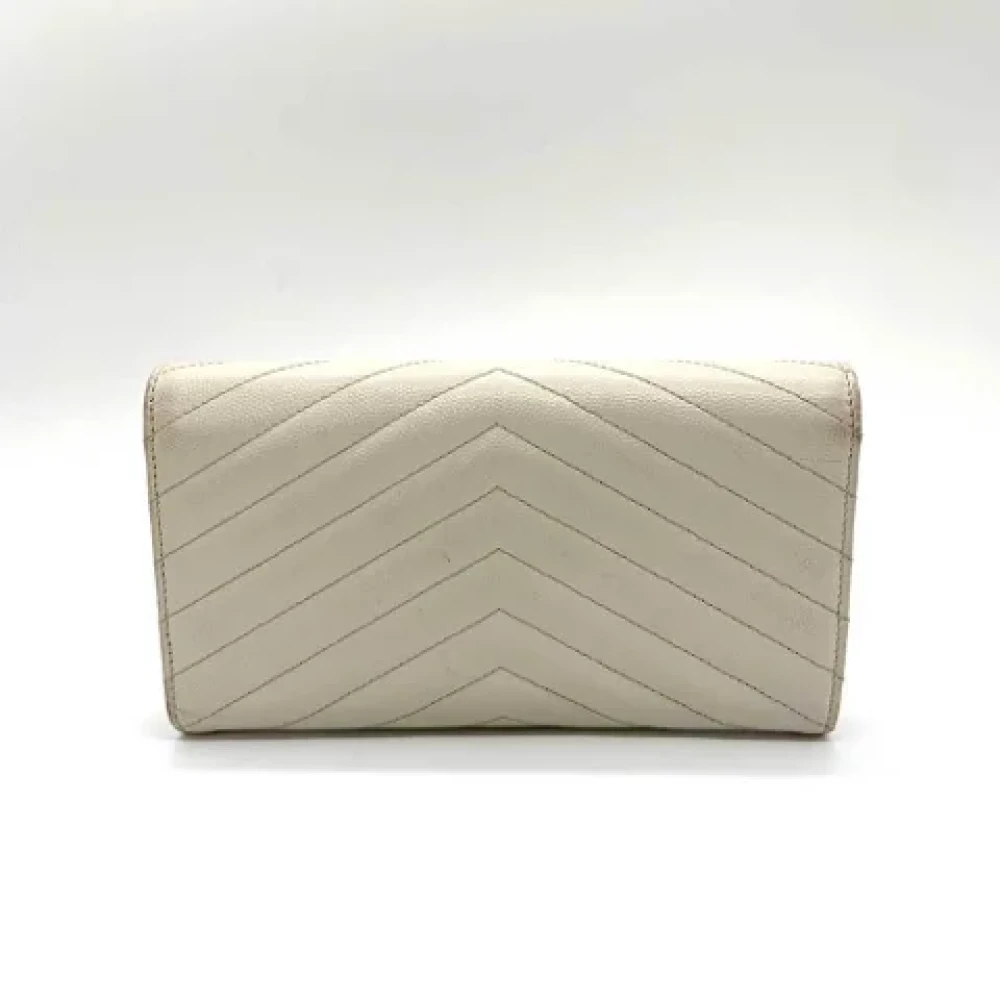 Yves Saint Laurent Vintage Pre-owned Leather wallets Beige Dames