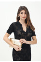 polo-noir-a-manches-courtes-avec-motif-etoile