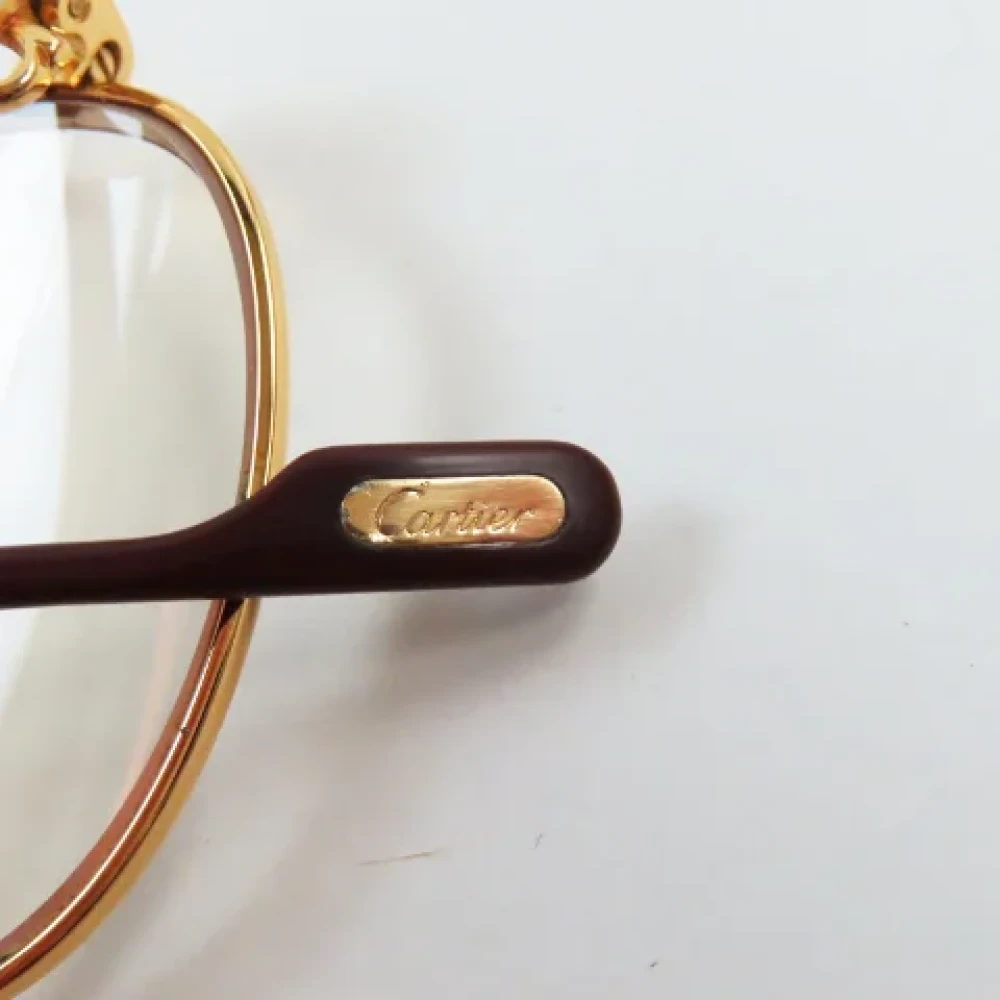 Cartier Vintage Pre-owned Metal sunglasses Yellow Heren