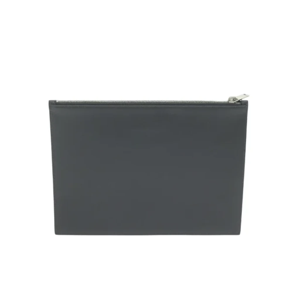 Yves Saint Laurent Vintage Pre-owned Leather clutches Gray Dames