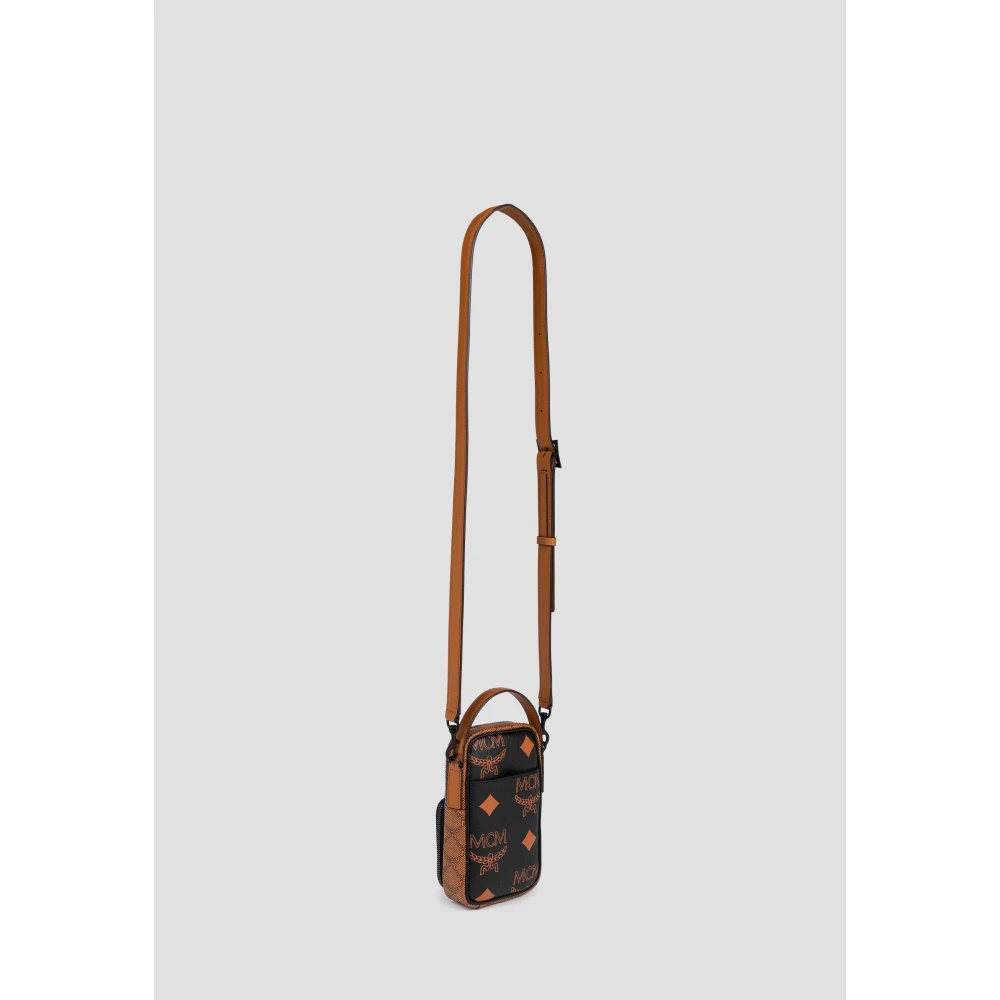 MCM Aren smartphonehoes met schouderband in monogrammix. Black Dames