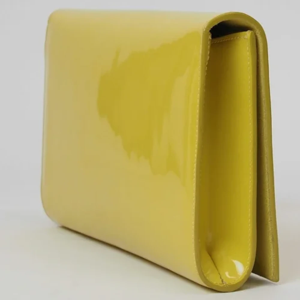 Yves Saint Laurent Vintage Pre-owned Leather clutches Yellow Dames