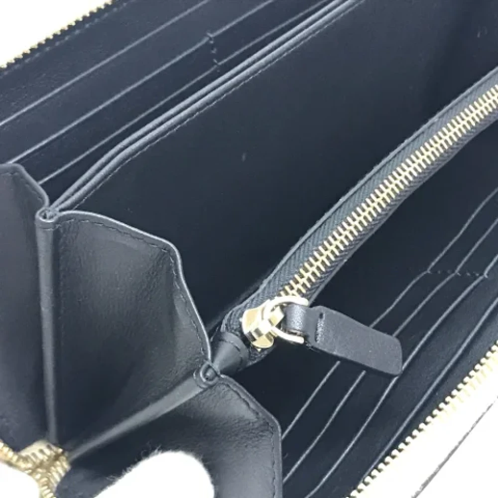 Valentino Vintage Pre-owned Leather wallets Yellow Dames