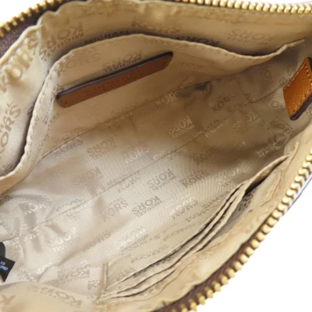 Michael Kors Pre-owned Plastic handbags Brown Dames