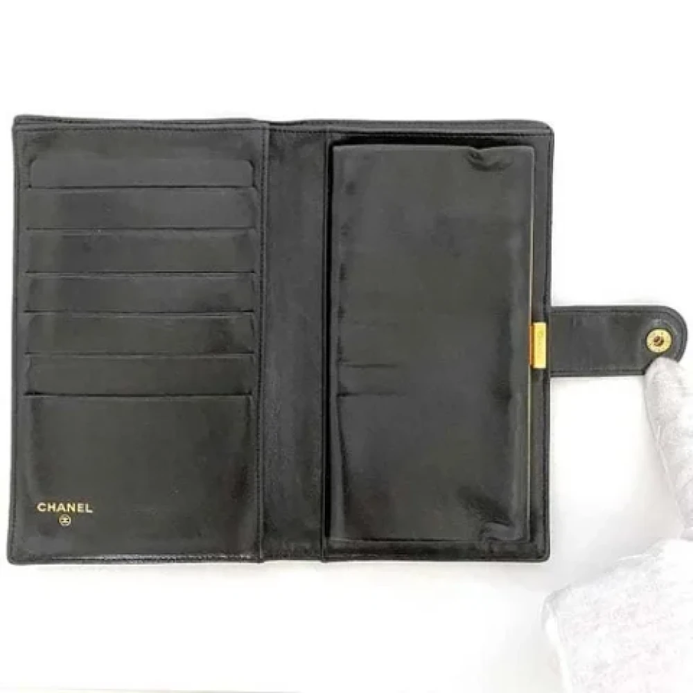 Chanel Vintage Pre-owned Leather wallets Black Dames