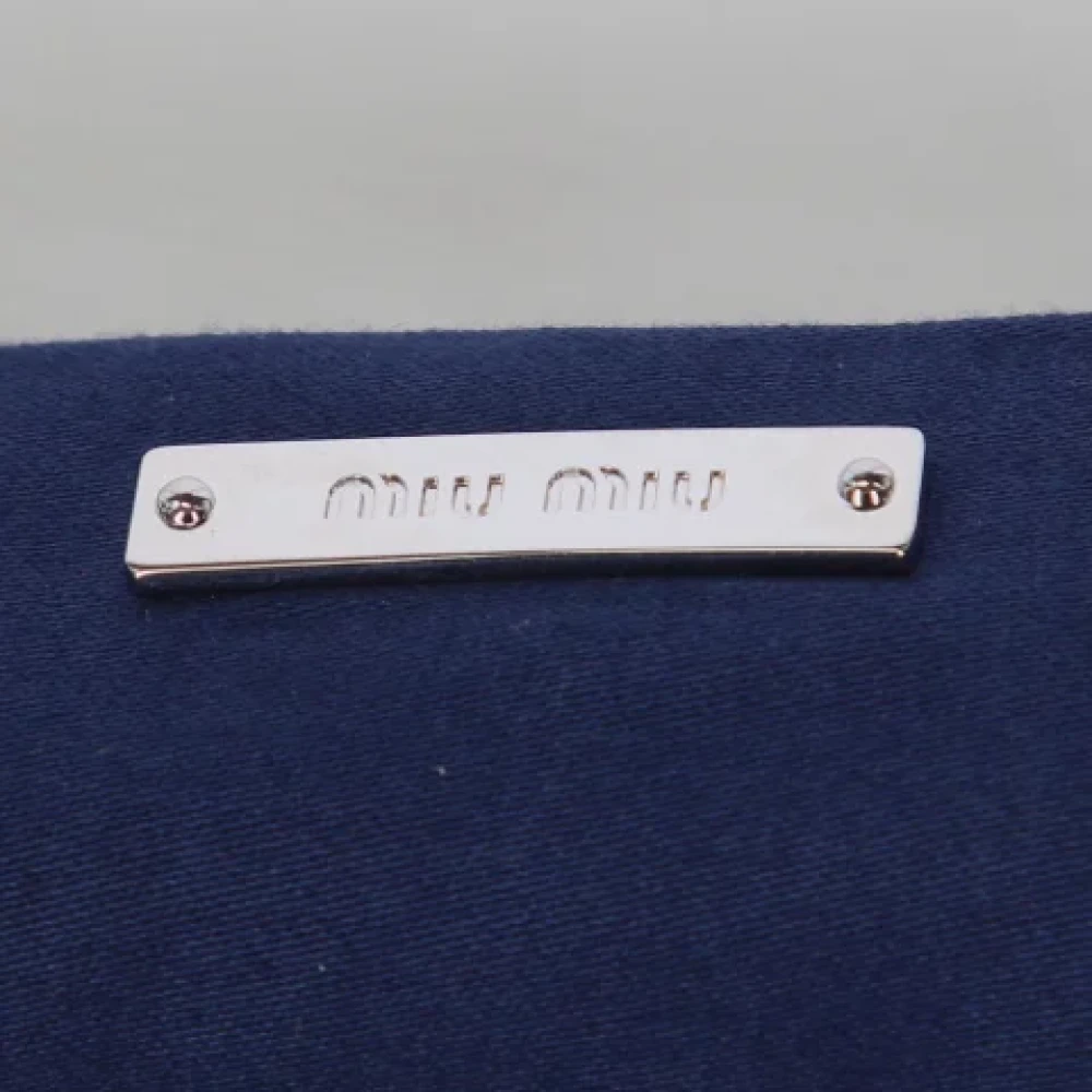 Miu Pre-owned Leather clutches White Dames