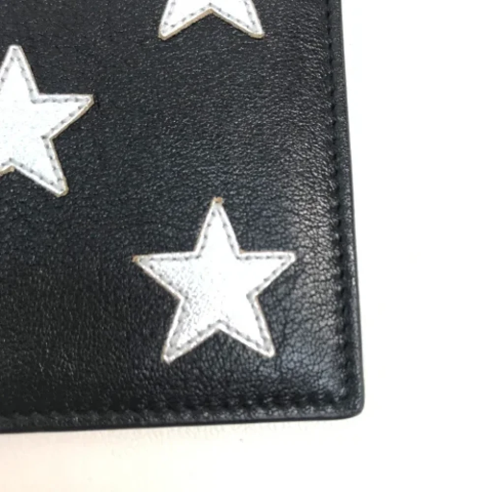 Yves Saint Laurent Vintage Pre-owned Leather wallets Black Heren