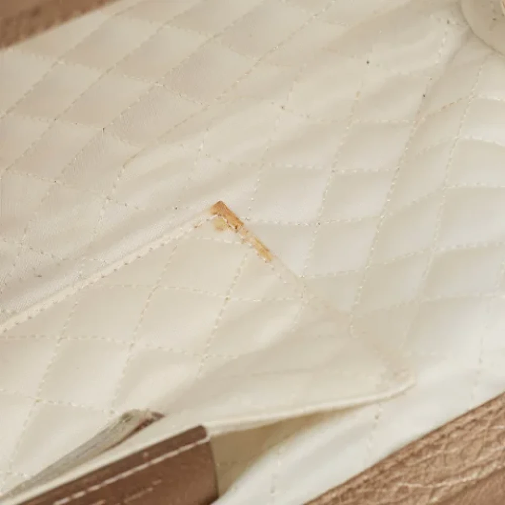 Salvatore Ferragamo Pre-owned Leather clutches Beige Dames