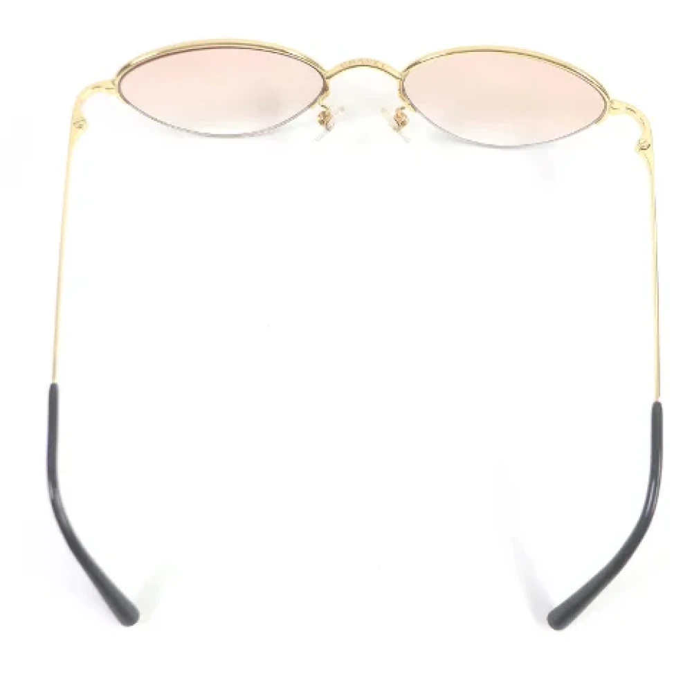 Chanel Vintage Pre-owned Metal sunglasses Yellow Dames