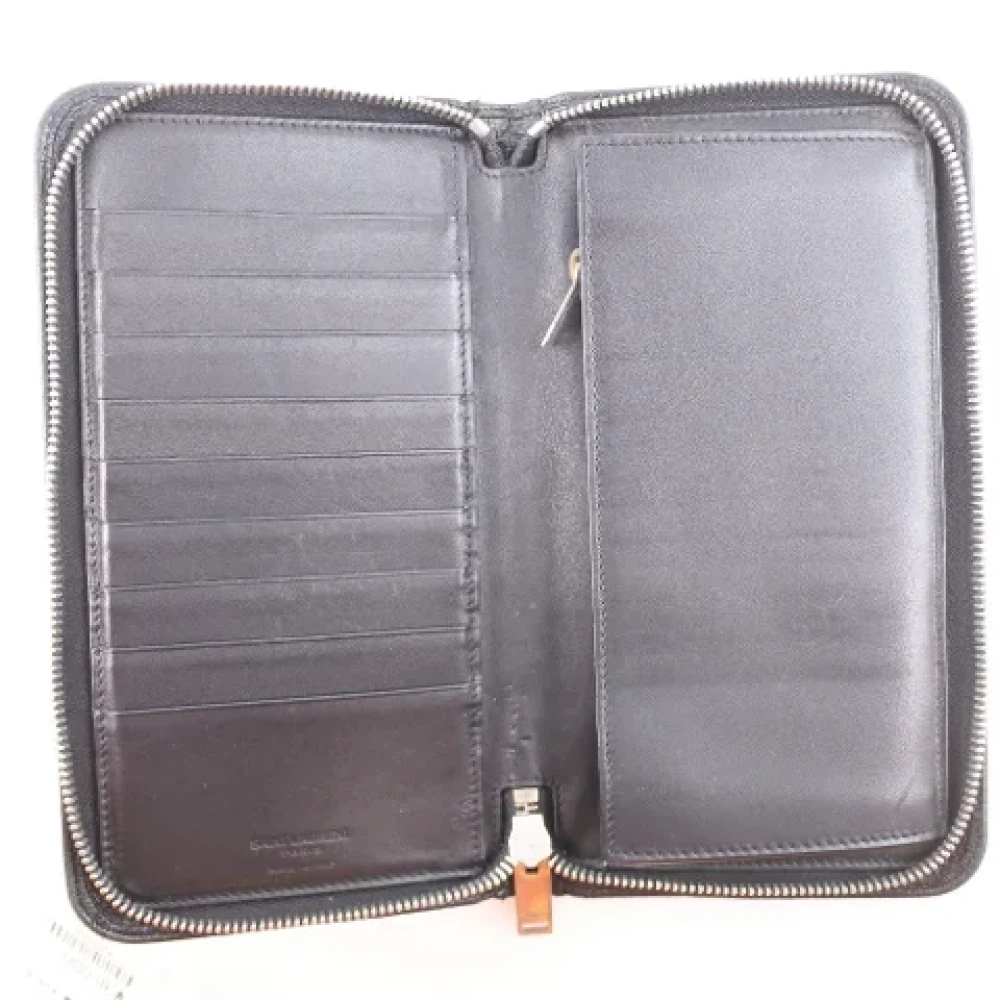 Yves Saint Laurent Vintage Pre-owned Leather wallets Black Heren