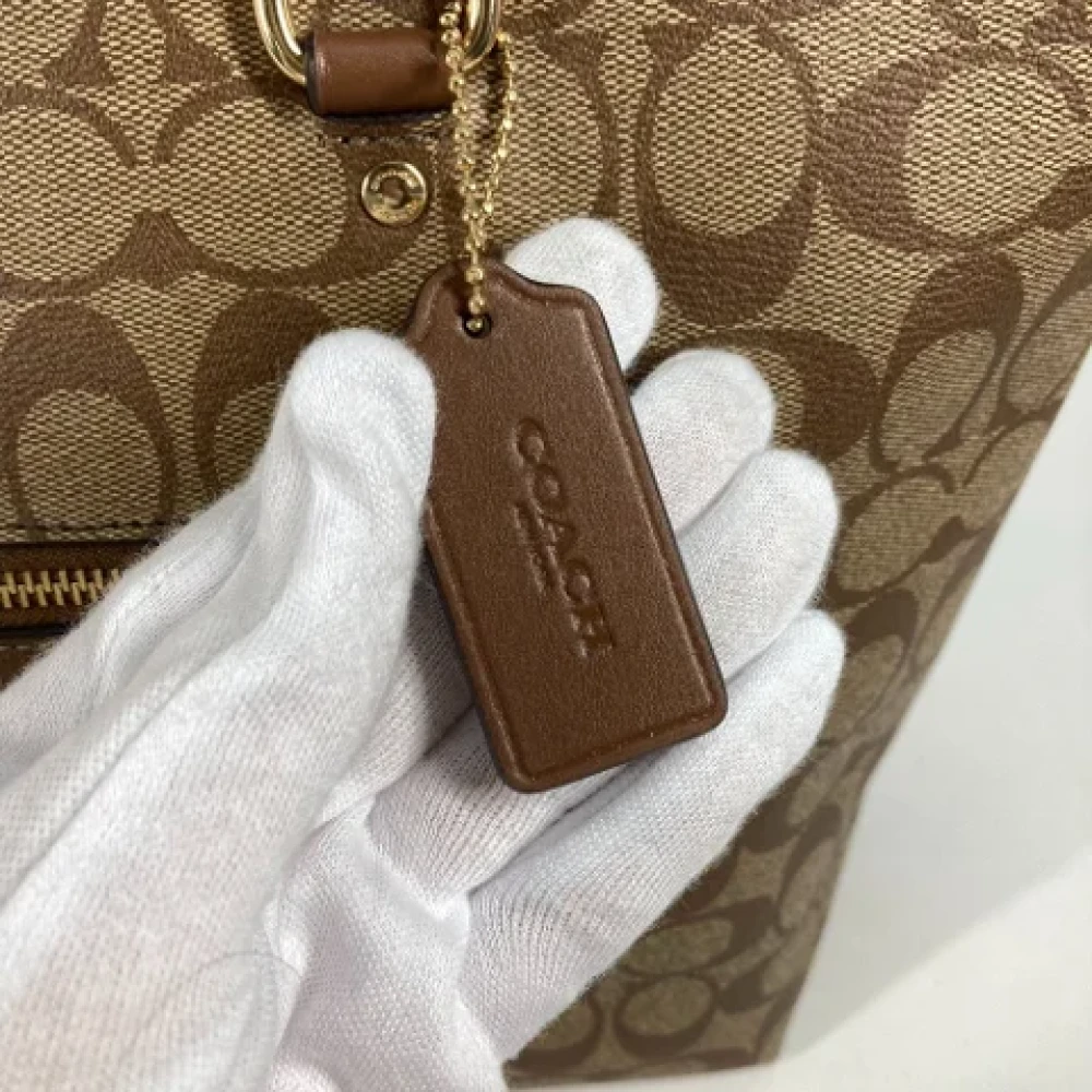 Coach Pre-owned Fabric handbags Brown Dames