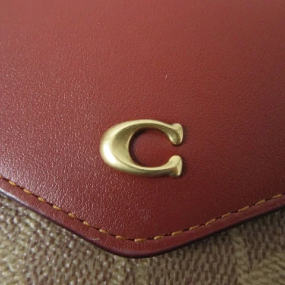 Coach Pre-owned Canvas wallets Brown Dames