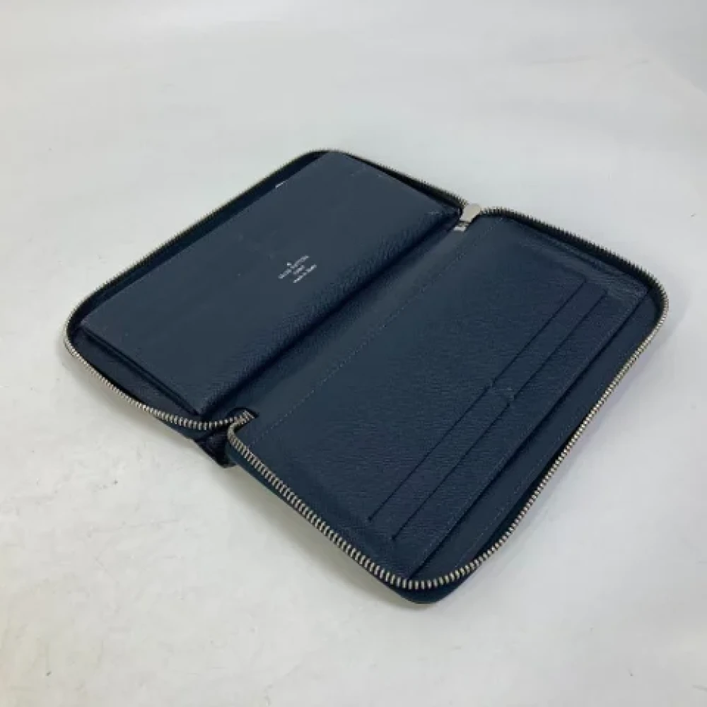 Louis Vuitton Vintage Pre-owned Leather wallets Blue Heren