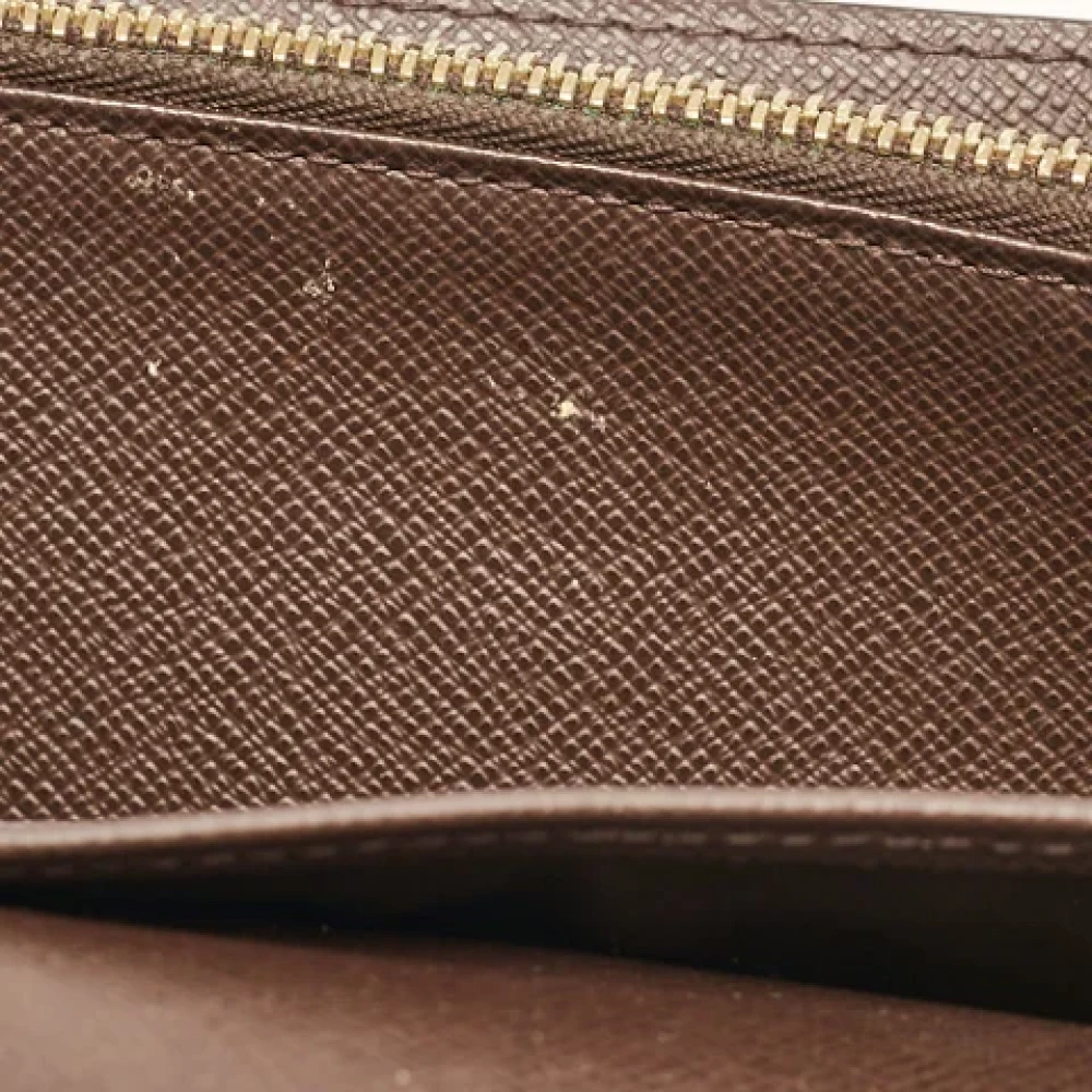Louis Vuitton Vintage Pre-owned Coated canvas wallets Brown Dames
