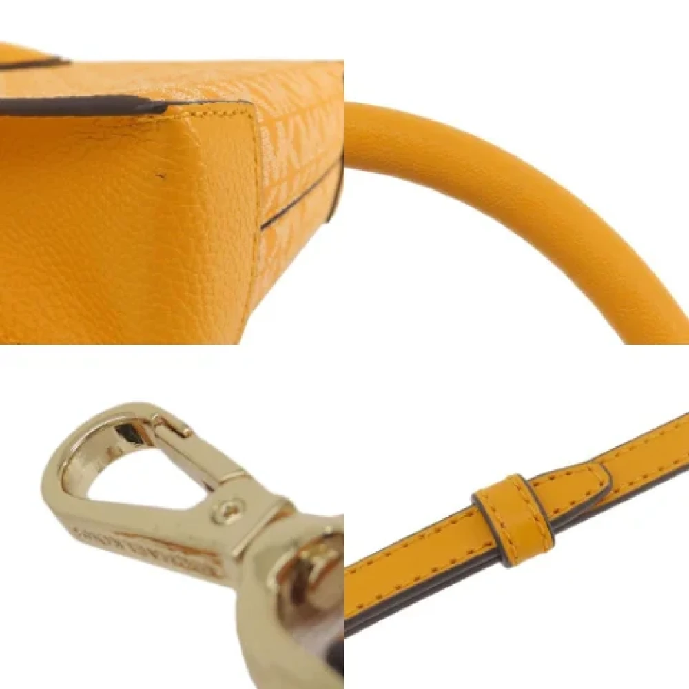 Michael Kors Pre-owned Canvas handbags Yellow Dames