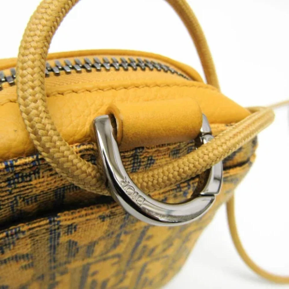 Dior Vintage Pre-owned Leather pouches Yellow Dames