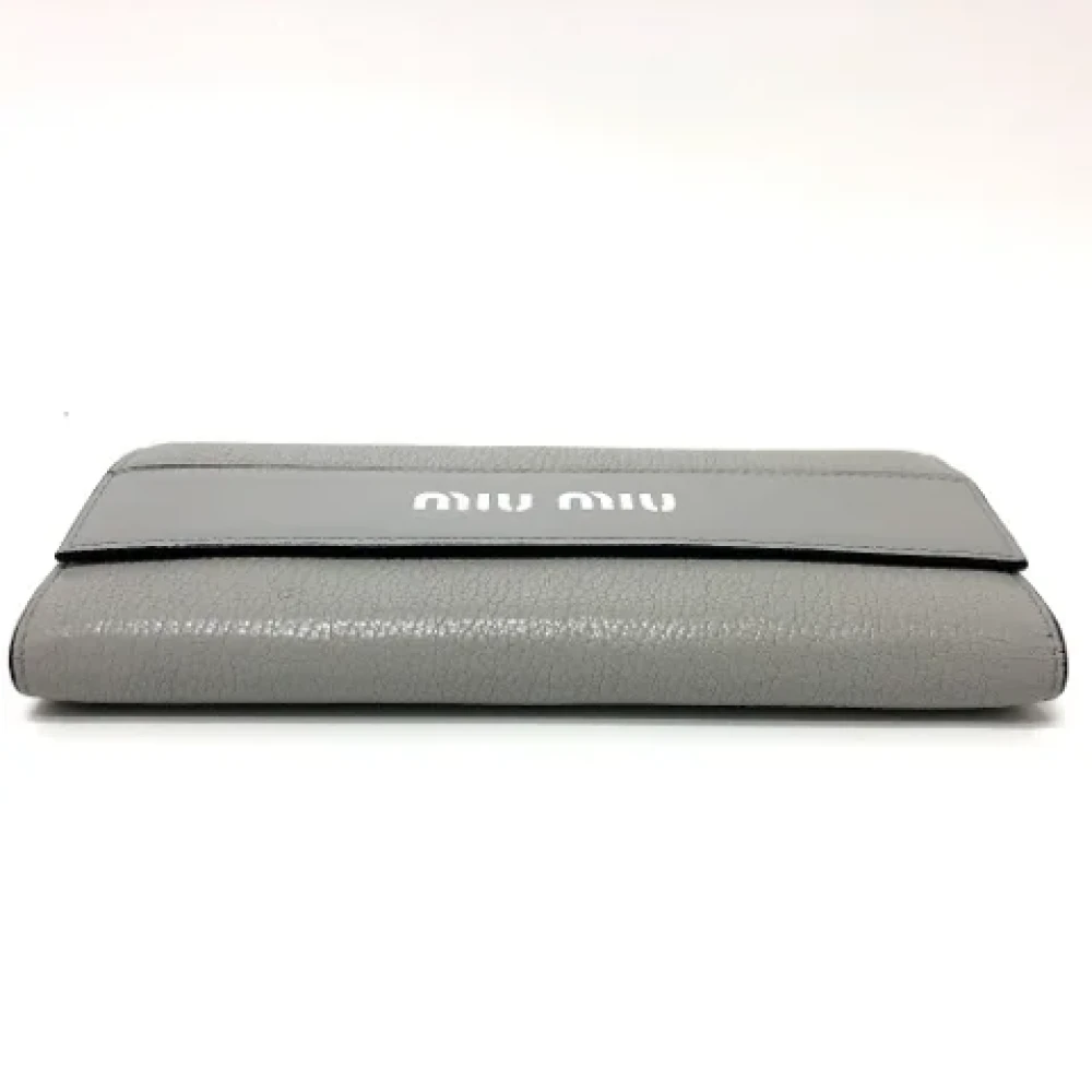 Miu Pre-owned Leather wallets Gray Dames