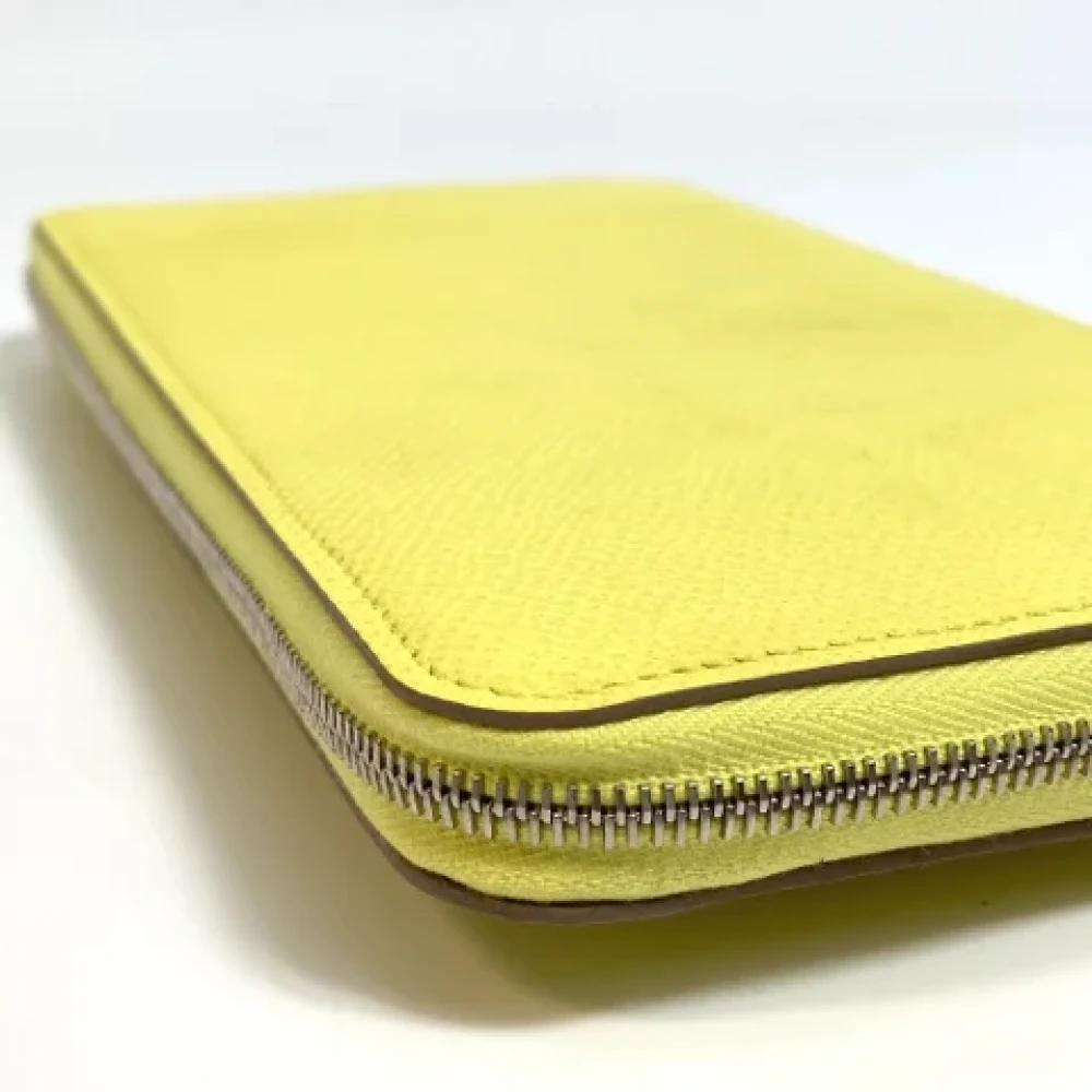 Hermès Vintage Pre-owned Leather wallets Yellow Dames
