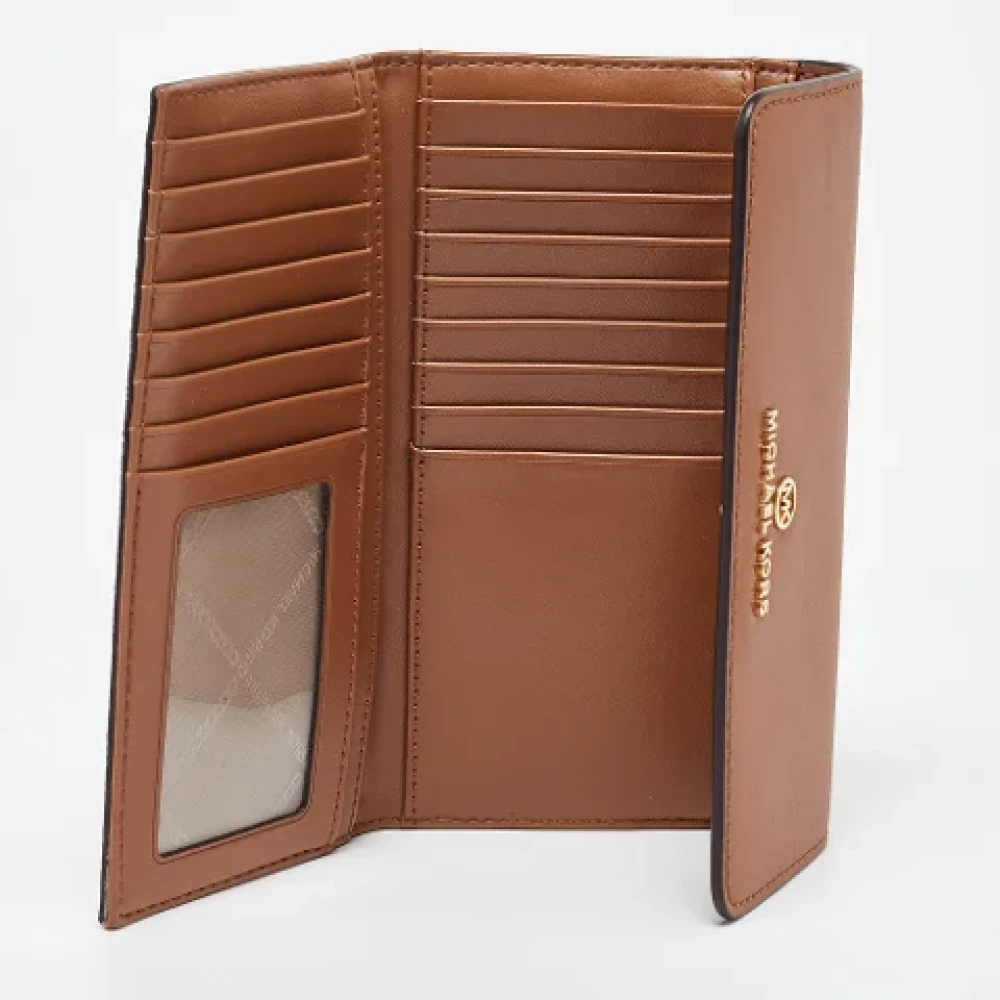 Michael Kors Pre-owned Leather wallets Brown Dames