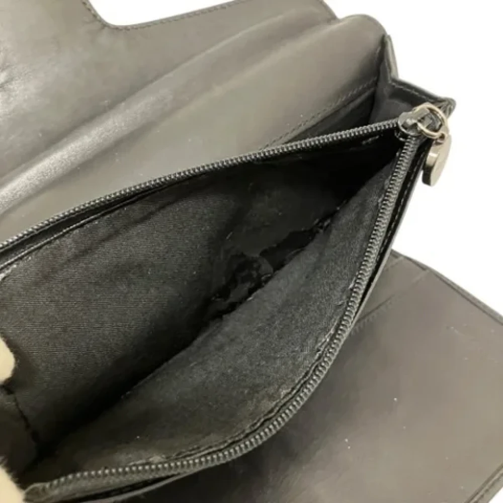 Salvatore Ferragamo Pre-owned Leather wallets Black Unisex