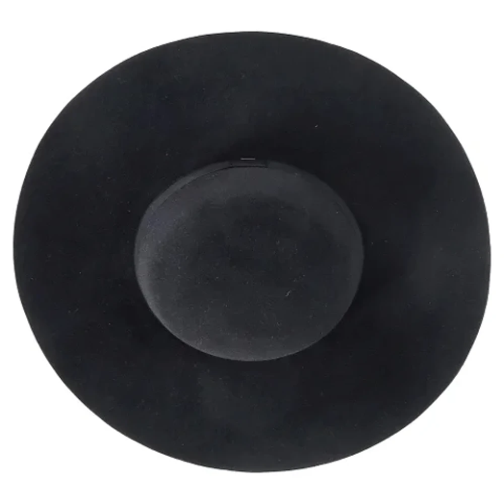 Yves Saint Laurent Vintage Pre-owned Wool hats Black Dames