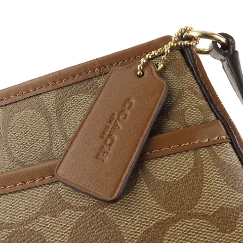Coach Pre-owned Plastic shoulder-bags Brown Dames