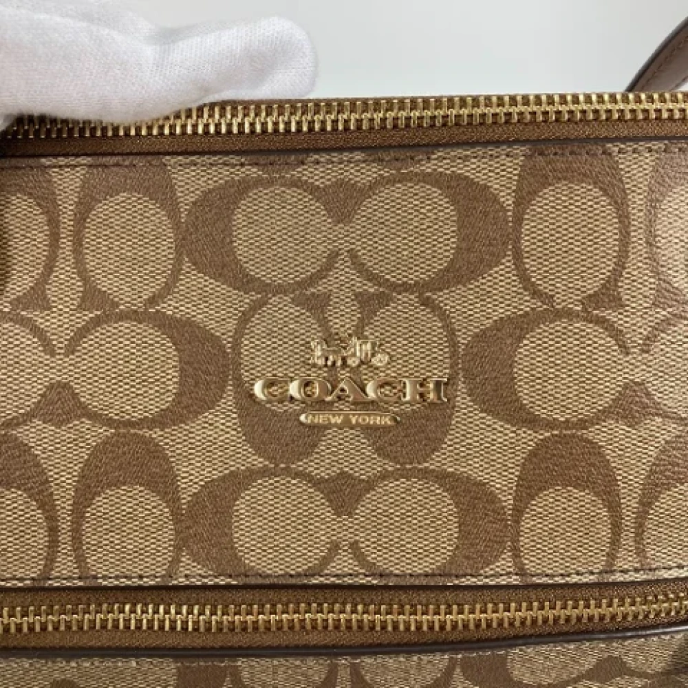 Coach Pre-owned Fabric handbags Brown Dames