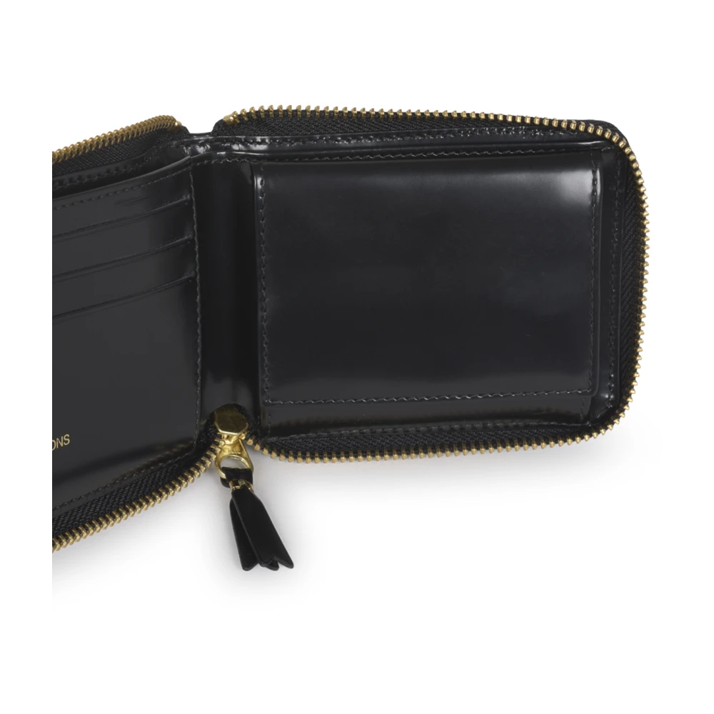 Comme des Garçons Zwarte portemonnees met polka dot reliëf Black Dames