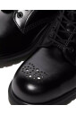 botte-brogue-en-cuir-noir