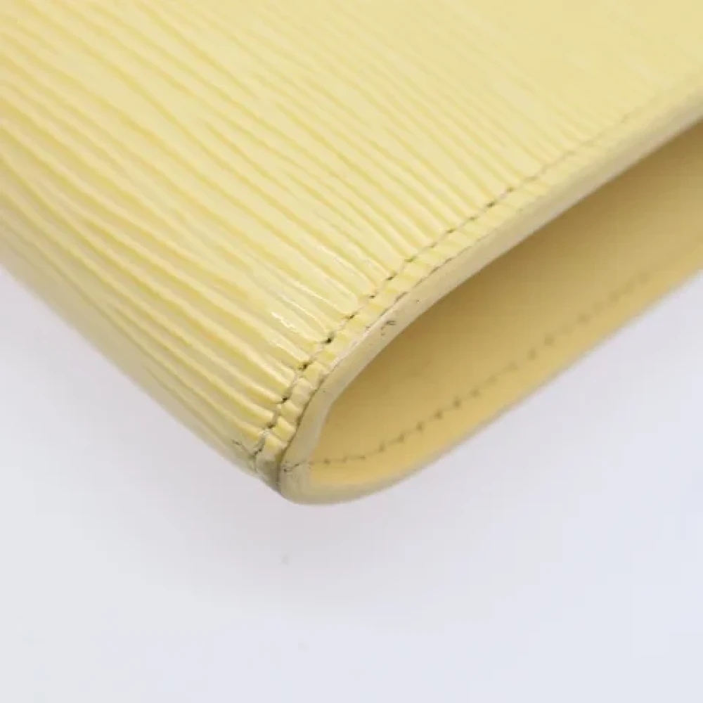 Louis Vuitton Vintage Pre-owned Leather clutches Beige Dames
