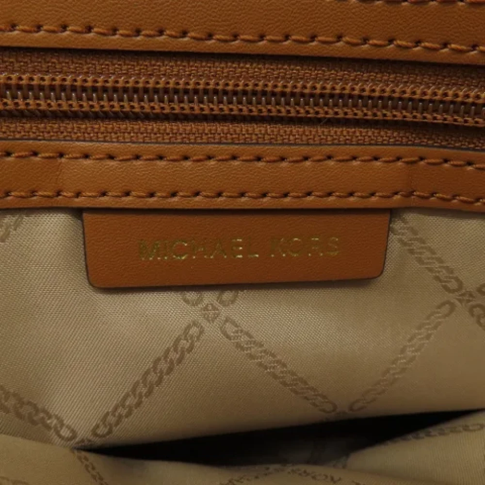 Michael Kors Pre-owned Plastic handbags Brown Dames