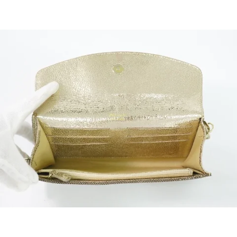 Jimmy Choo Pre-owned Leather clutches Yellow Dames